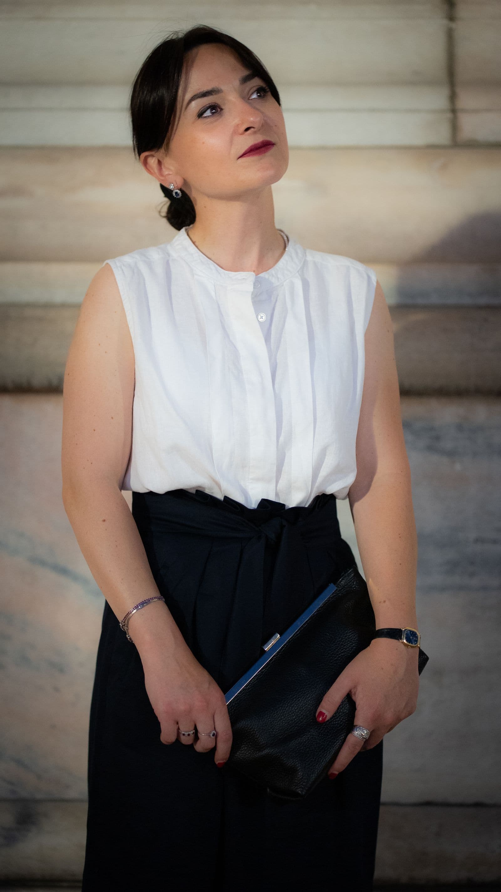 Woman in a refined business outfit on a Milan street