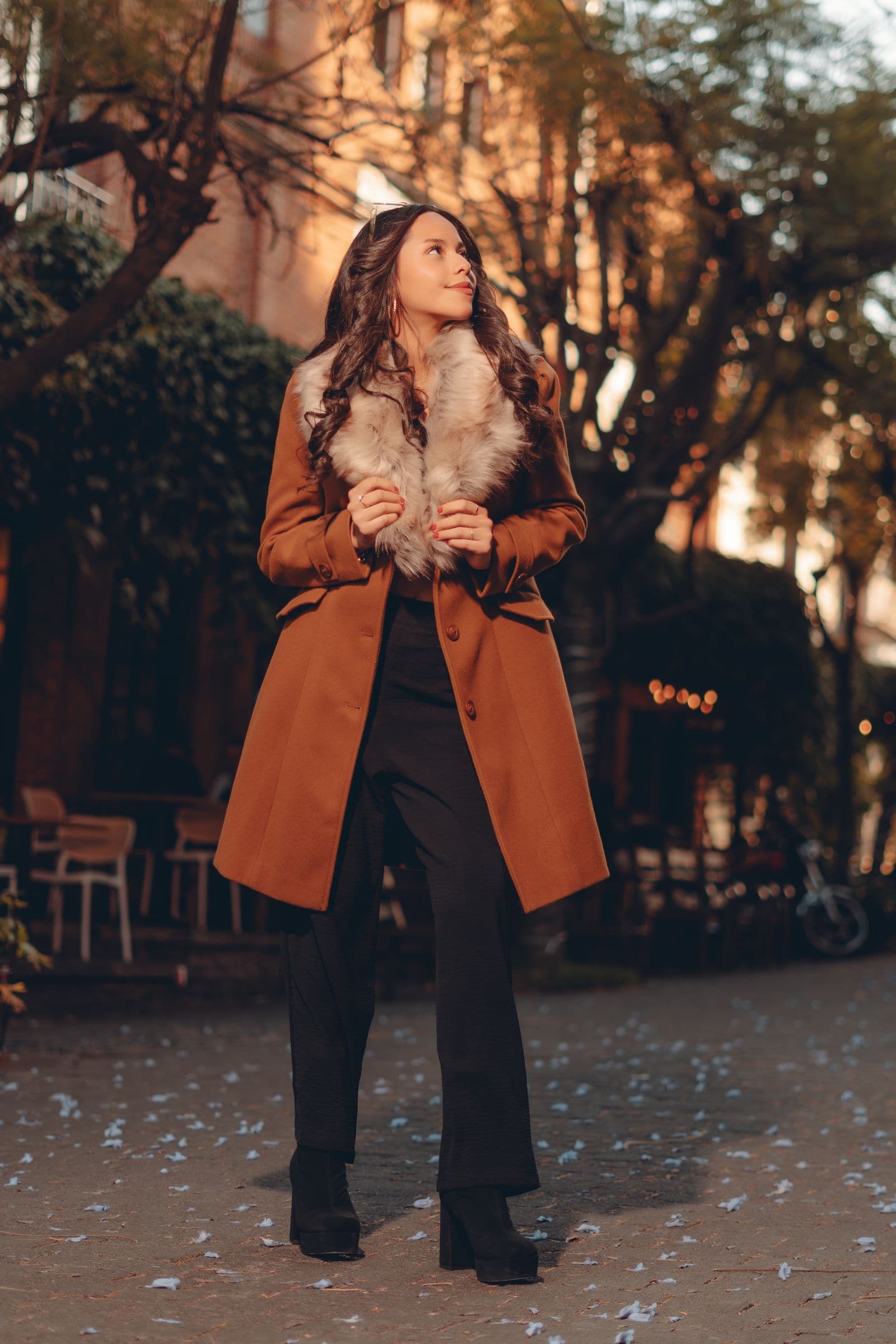 Woman in a stylish winter coat on a city street