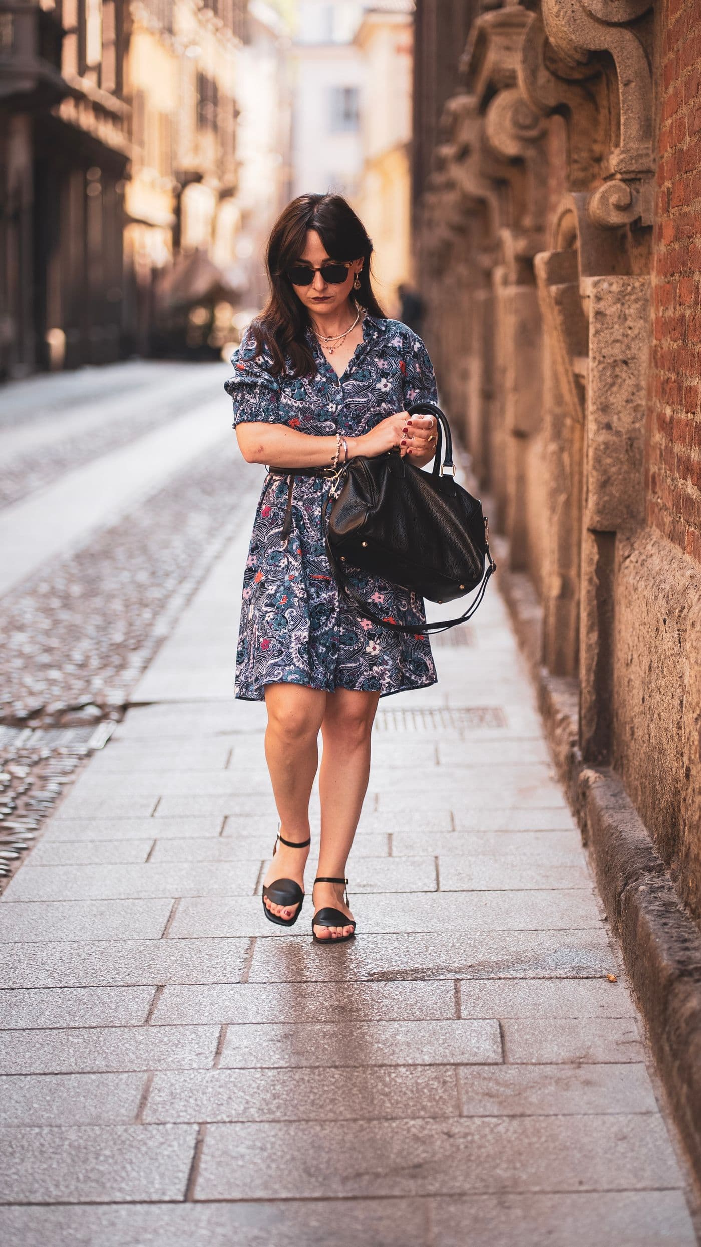 Stylish woman walking on a Milan street